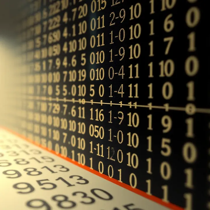 Visual representation of decimal numbers transitioning to binary format using division by two